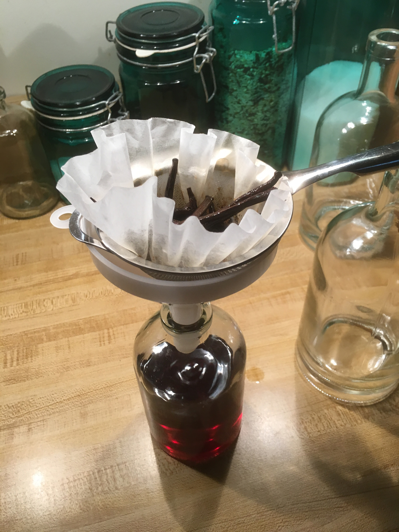 Straining The Vanilla Extract